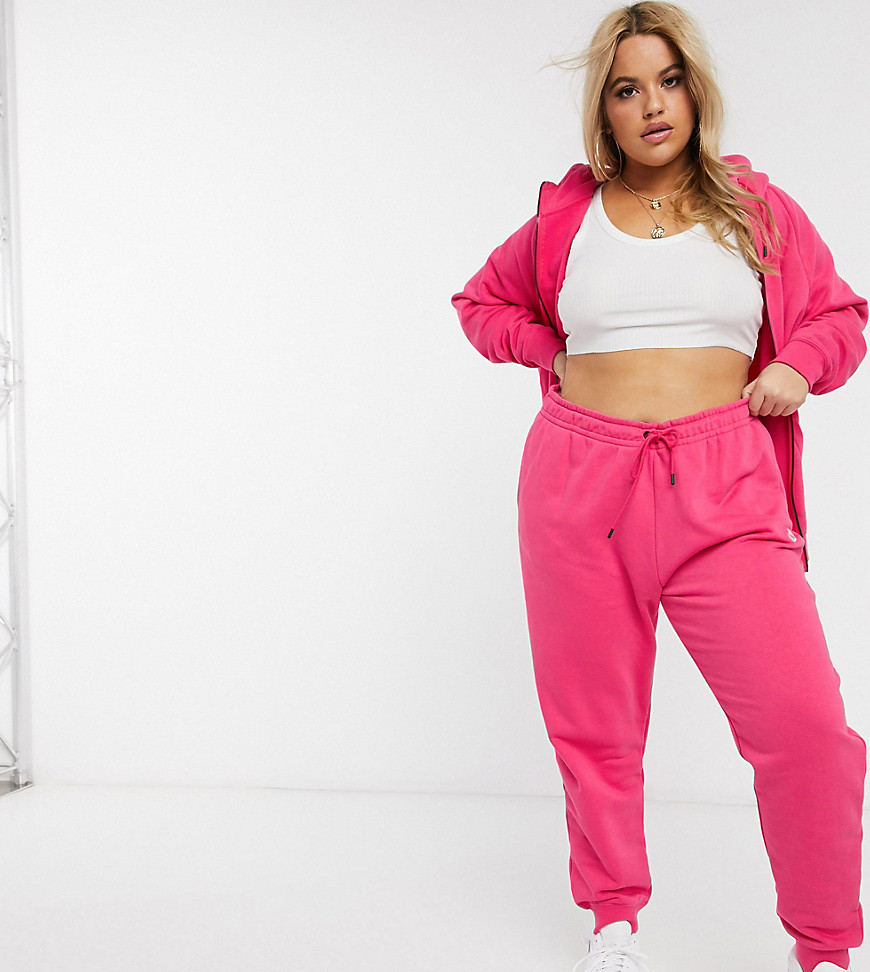 Nike Plus Essentials joggers in pink