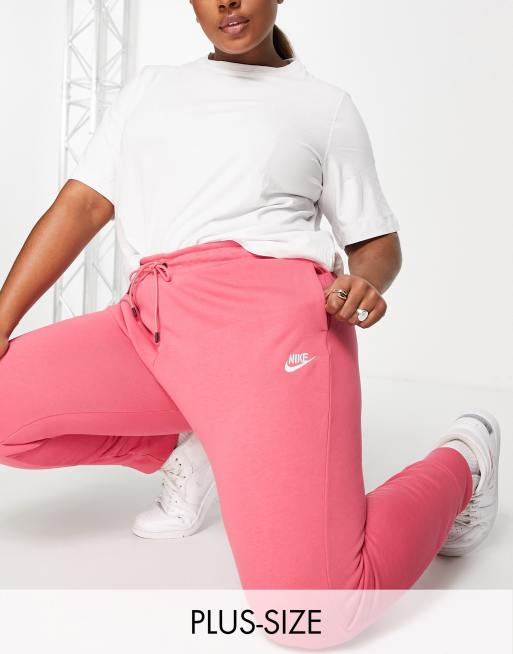 Nike Plus - Essentials - Lyserøde joggingbukser i fleece i regular fit