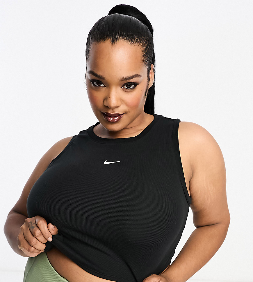 Nike Plus mini swoosh curve hem tank vest top in black