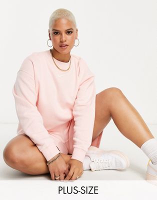 Nike Plus mini swoosh oversized crew sweatshirt in light pink