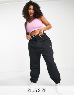 Nike Plus mini swoosh oversized high rise joggers in black and sail