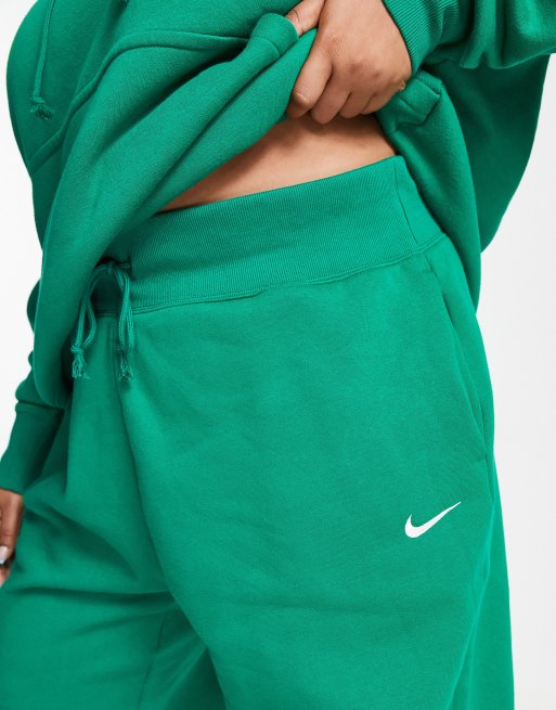 Nike mini swoosh oversized high rise joggers in black and sail