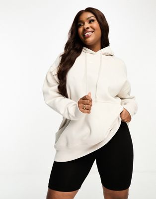 Nike Plus mini swoosh oversized hoodie in light orewood brown - ASOS Price Checker