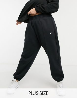 Nike Plus mini swoosh oversized jogger in black