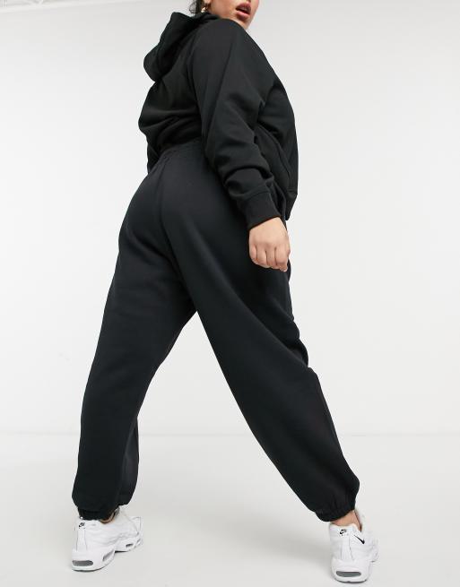 Nike mini Swoosh oversized joggers in black