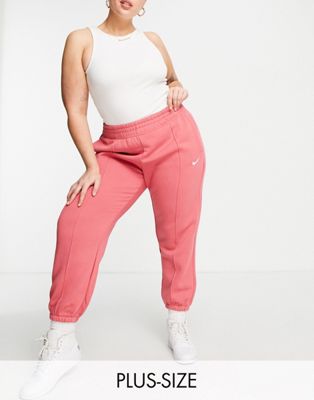 Nike Plus mini swoosh oversized joggers in archaeo pink