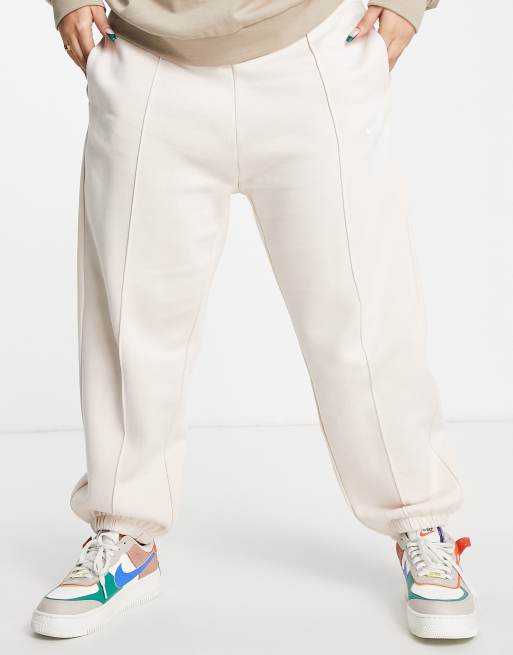 asos nike mini swoosh oversized joggers