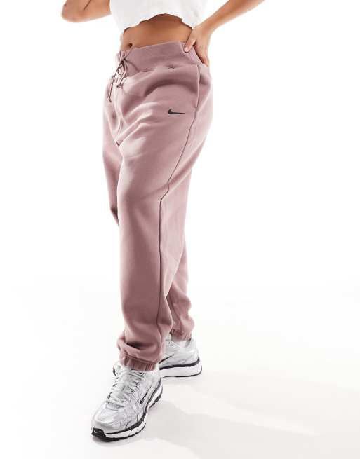 Nike Plus mini swoosh oversized joggers in smokey mauve