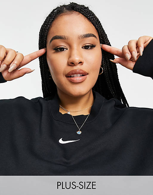 Nike Plus mini swoosh oversized sweatshirt in black