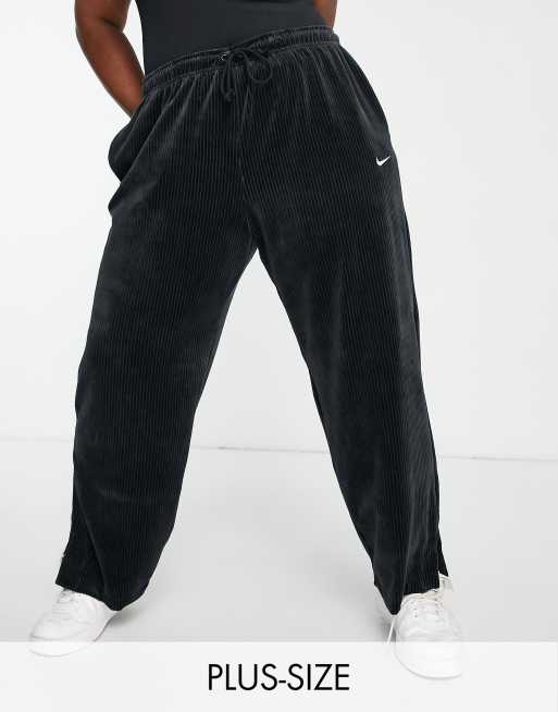 Nike Plus Pantalon de jogging large en velours c tel Noir ASOS