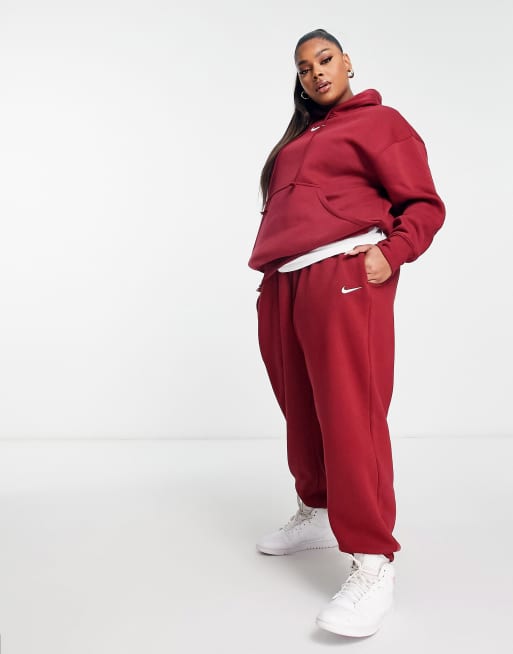 Womens red best sale nike joggers