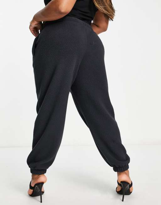 Nike Plus plush joggers in black