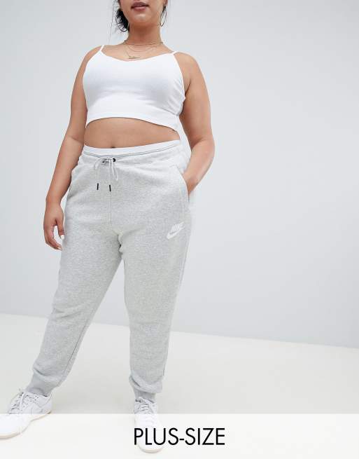 Nike rally grey store swoosh logo slim joggers