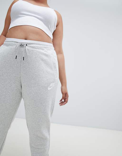 Nike rally grey swoosh logo best sale slim joggers