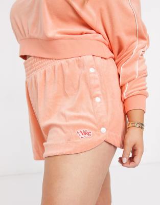 nike terry towelling shorts in orange