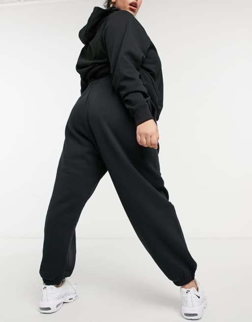 Nike Plus Trend Fleece oversized cuffed sweatpants in black ASOS
