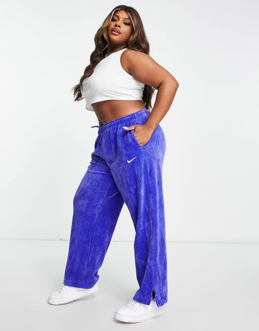 Nike Plus velour cord wide leg joggers in lapis blue