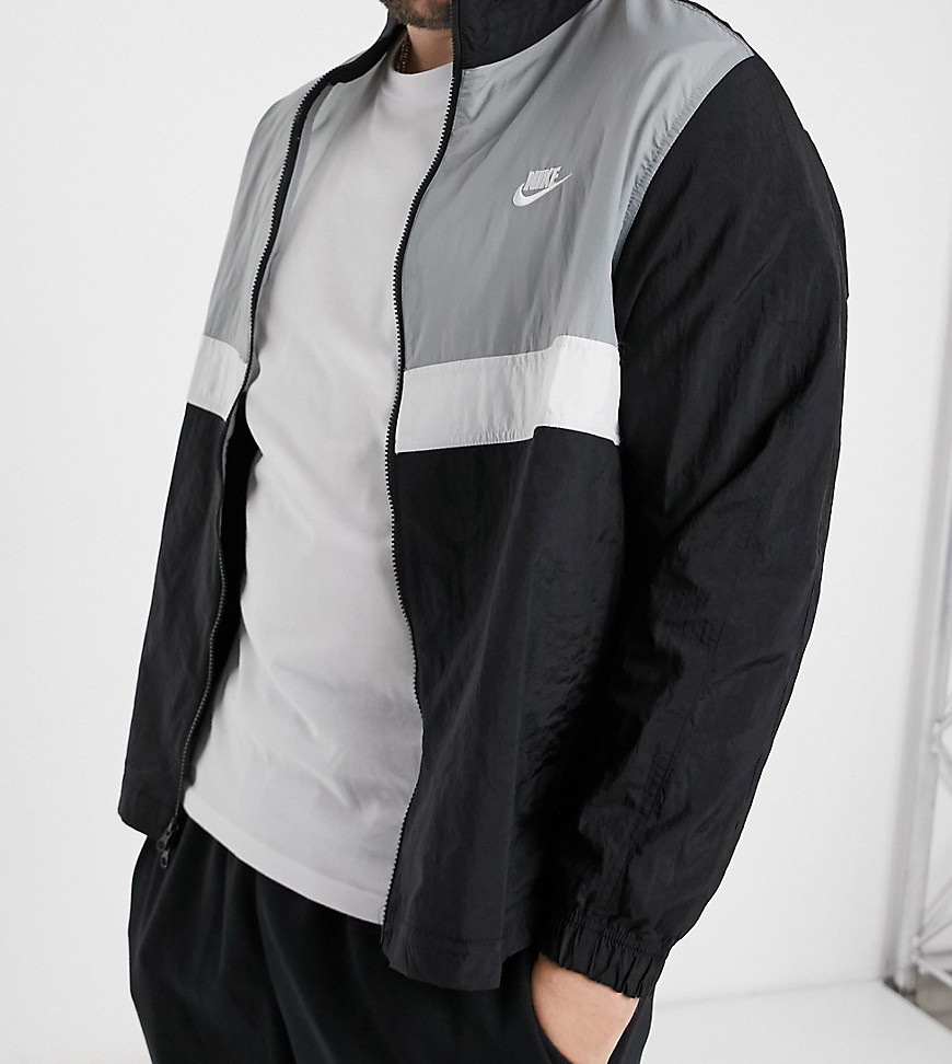 Nike Plus woven track jacket in black and gray