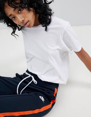 nike polyknit track pants in blue and orange