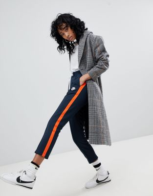 nike polyknit track pants in blue and orange