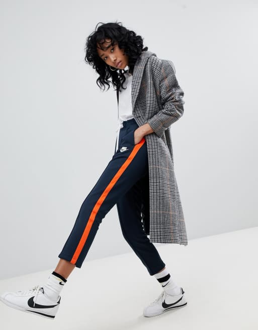 Nike polyknit track pants sales in blue and orange