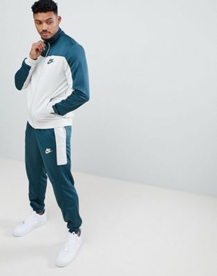 nike woven tracksuit set in green