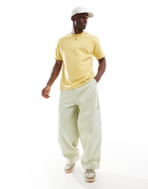 Nike Premium Essential oversized t-shirt in yellow, 3 of 4