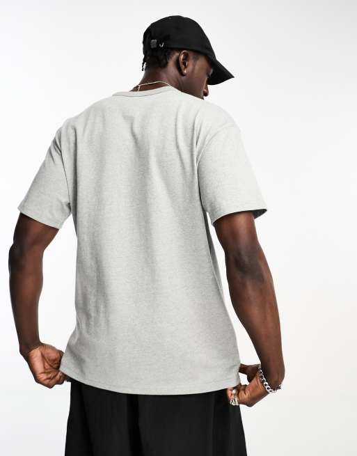 Nike Premium essentials logo t-shirt in grey with pocket