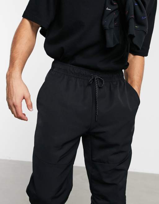 Nike Premium Essentials Winterized sweatpants in black ASOS