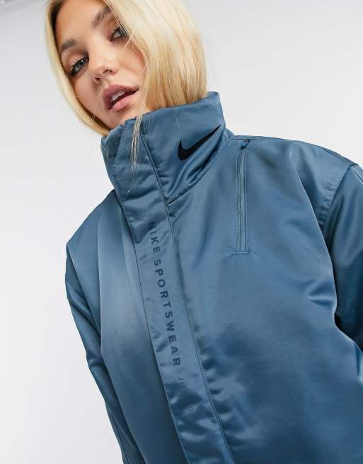 Nike - Premium jack in groenblauw met kraag met logoprint