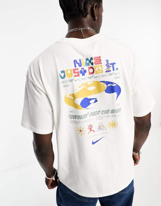 tan and white nike shirt