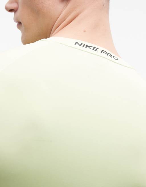 Nike Pro DRI-Fit long sleeve top in lime , 5 of 5