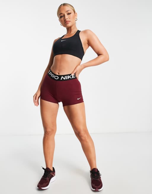 Nike Yoga jumpsuit in burgundy, ASOS