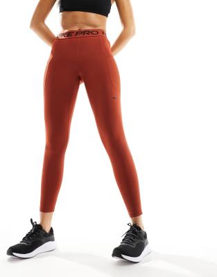 Nike Pro Training 365 7/8 mid rise leggings in rugged orange