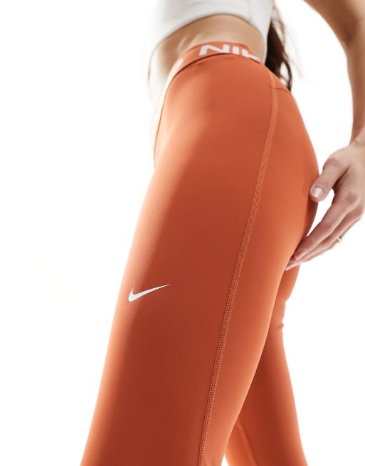 Nike leggings orange best sale