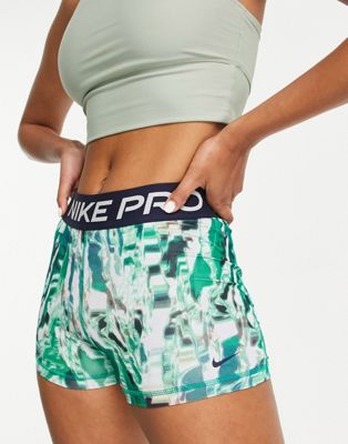 Nike Pro Training AOP graphic 3 inch booty shorts in green | ASOS