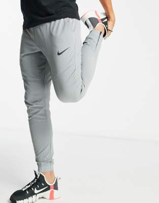 grey nike trackies