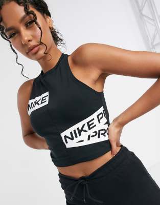 nike pro training crop tank in black with taping