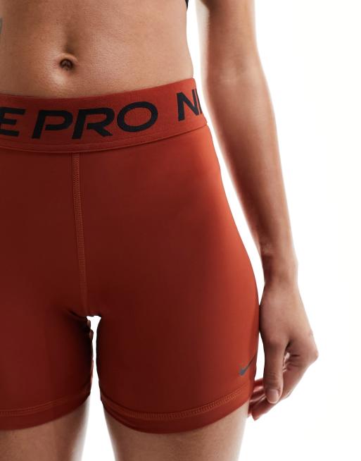 Nike Pro Training Dri Fit 5 inch shorts in rugged orange ASOS