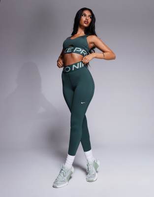 Nike Pro Training Dri-FIT high waisted sculpt leggings in green ASOS