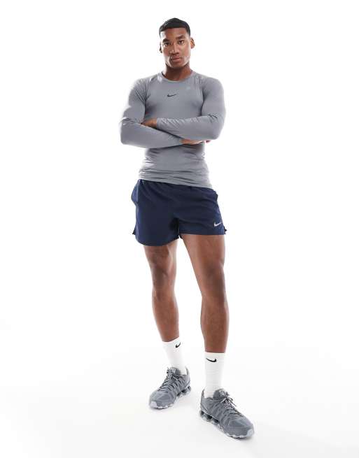 Nike Pro Training Dri FIT slim fit long sleeve top in dark grey ASOS