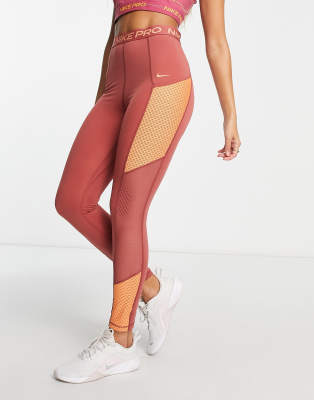 Nike Pro Training Femme Dri-FIT high rise leggings in pink-Red