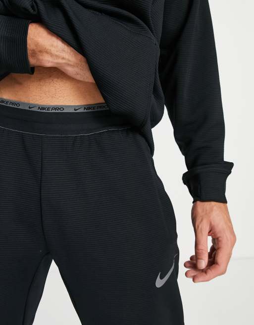 Nike Pro Training Fleece joggers in black ASOS