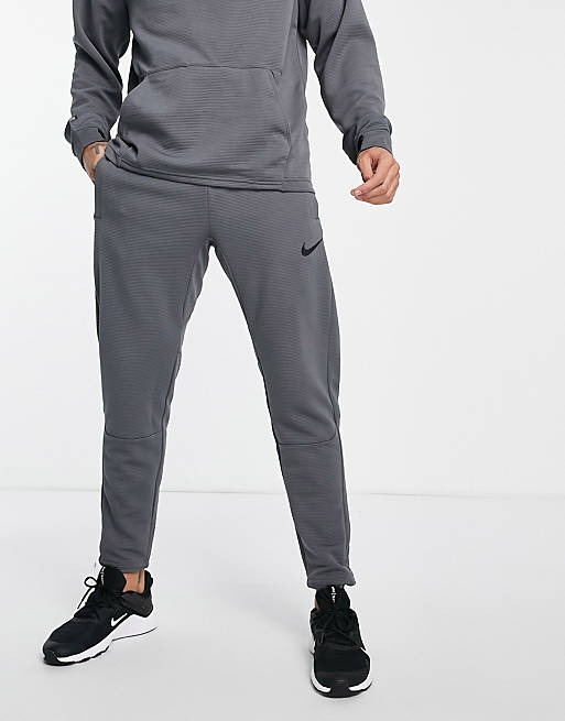 Men Nike Pro Training fleece joggers in grey 