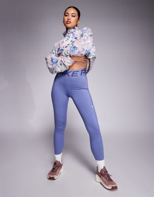 Nike - Pro Training - Formende Leggings in Blau mit hohem Bund