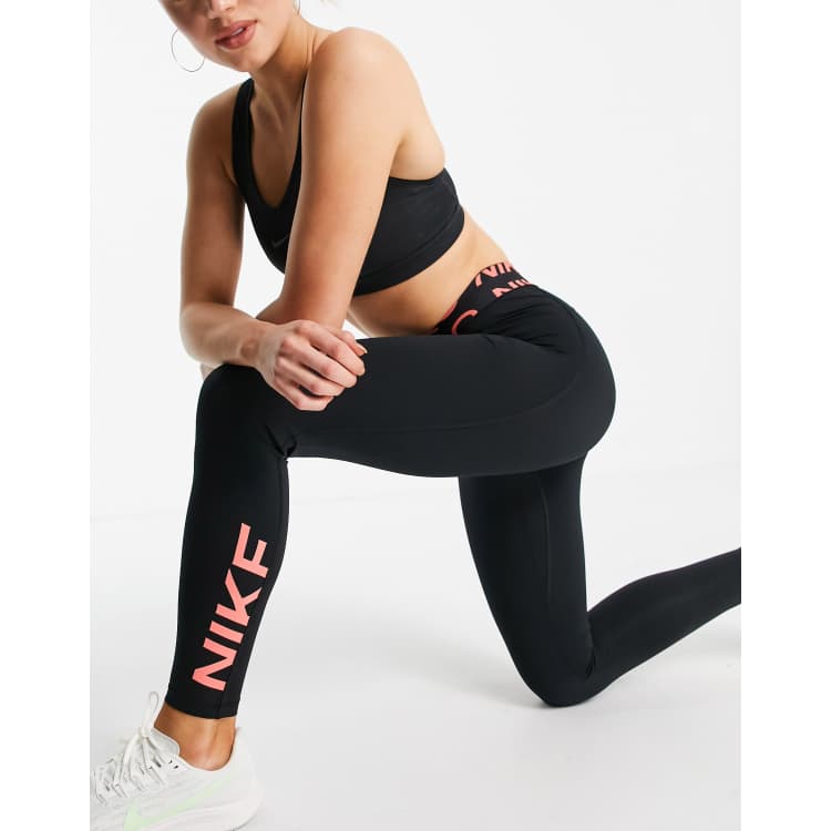 Nike Pro Training GRX leggings in black and orange