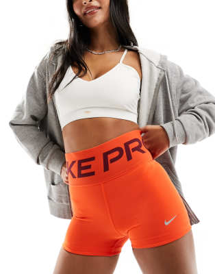 Nike Pro Training Icon Clash 3 inch shorts in orange