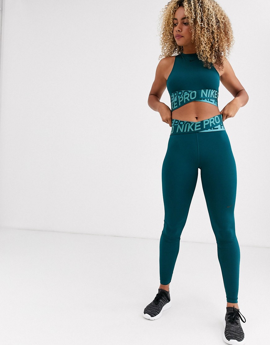 Nike Pro Training - Legging met gekruiste tailleband in blauwgroen