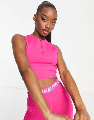 Nike Pro Training Seasonal Dri-FIT cropped vest top in pink - ASOS Price Checker