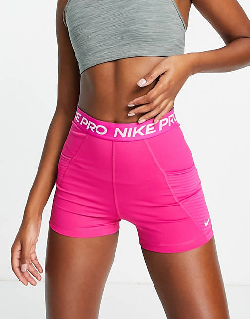 Reis Voorouder Bedienen Nike Pro Training Seasonal Dri-FIT high rise 3 inch booty shorts in pink |  ASOS